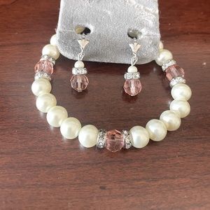 Peal like beaded bracelet with matching rose colored beaded earringgs